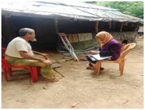 A Community Facilitator is collecting digital data with KOBO Tools