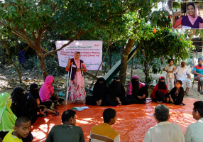Yasmin Akter, a physically impaired Youth Volunteer and Community Mobilizer, leads a community validation meeting to promote Disability-Inclusive Disaster Risk Reduction and Climate Change Adaptation under the Action for Change (A4C) Project, supported by CBM UK.